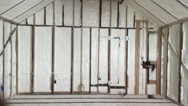 Interior of a building under construction with installed insulation, complying with San Francisco's green building code requirements.

              