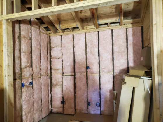  
                     Interior view of a wine cellar with spray foam insulation applied to walls and ceiling.

                     