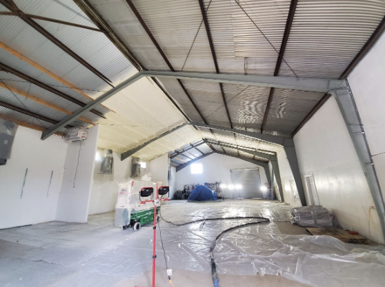  
         
         Interior view of a commercial building in San Jose with spray foam insulation on the walls and ceiling.

         