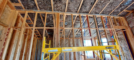  

                     Interior view of a custom home in Oakland with spray foam insulation applied to the ceiling, enhancing energy efficiency and temperature control.

                     