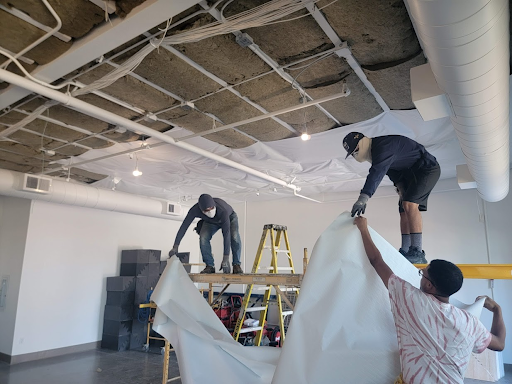  

                     Contractors insulating the ceiling of a commercial building in the SF Bay Area.

                     