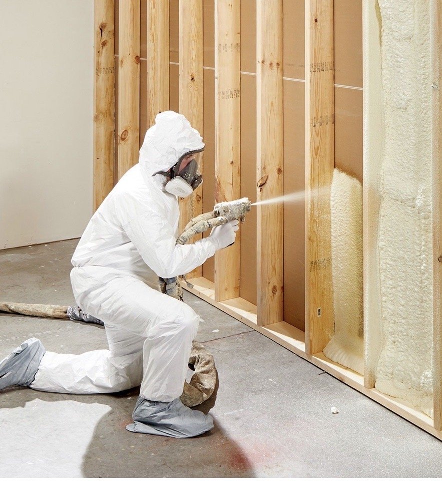  

                     Professional contractor installing spray foam insulation for a building wall.




                     