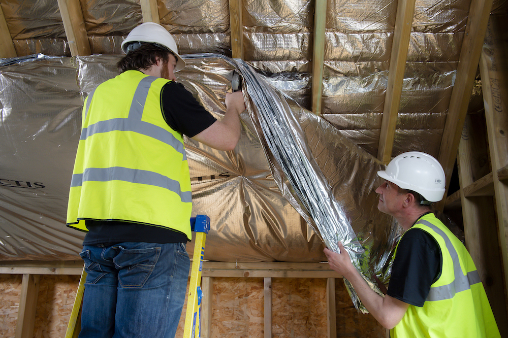  

                  Installation of a reflective insulation system.


                  