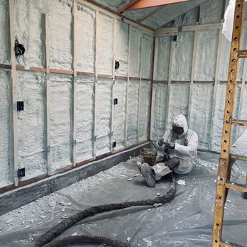  


                     Technician applying spray foam insulation, a top solution for energy efficiency and comfort in California.




                     