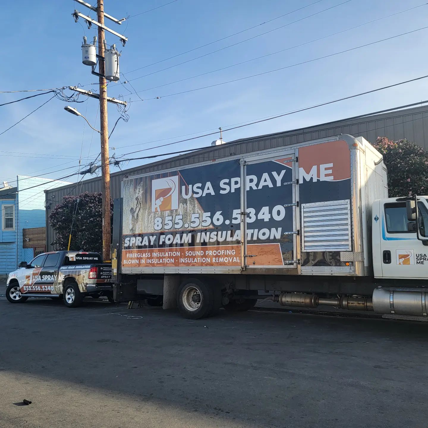  

                  USA Spray Me truck and vehicle parked in front of a building.





                  