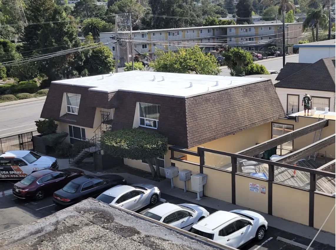  Completed insulation project on a residential building roof in San Francisco, meeting new building code requirements.              