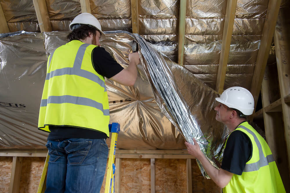 Installation of a reflective insulation system.