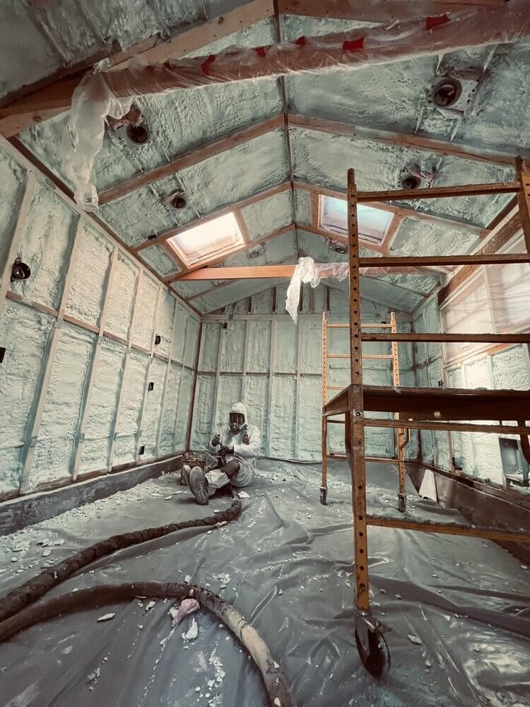 Spray foam insulation being professionally installed by an experienced USA Spray Me technician.