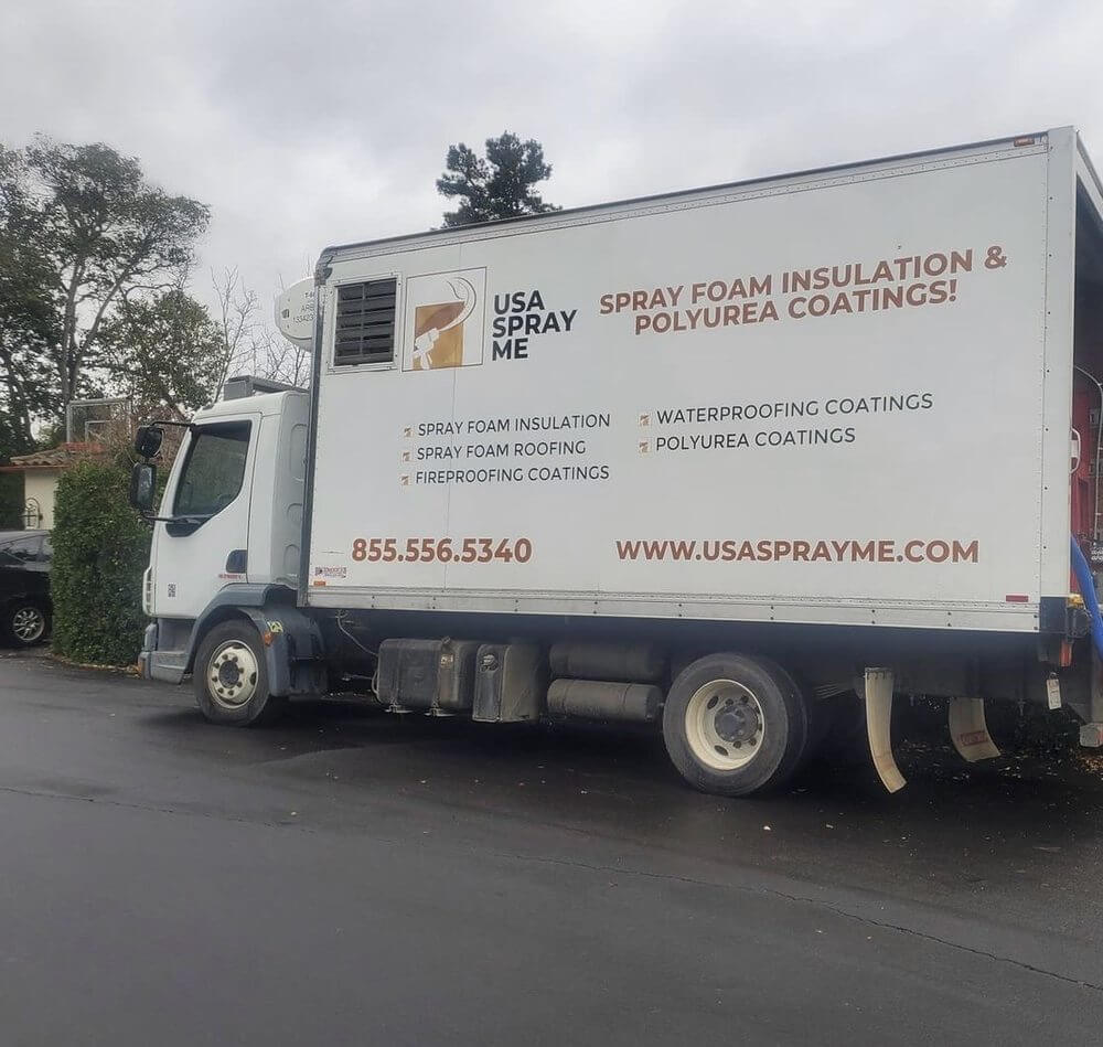 USA Spray Me truck with branding for spray foam insulation and polyurea coatings services.