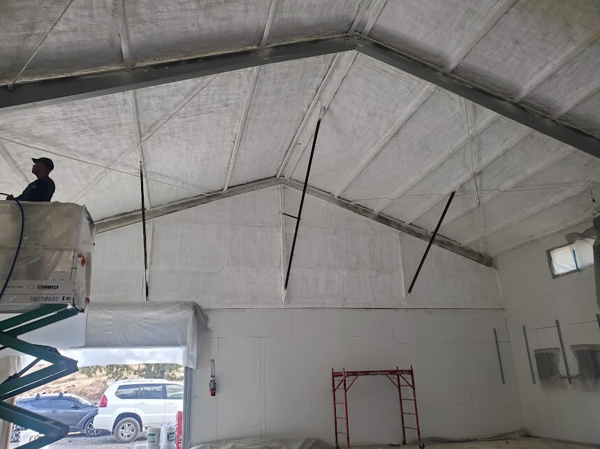  Spray foam insulation applied to a ceiling and walls.. 